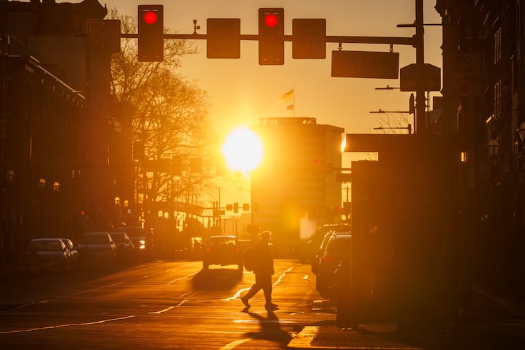 The sun rises over 4th and Market Street on Monday on the first workday of Daylight Saving Time. The sun, and spring warmth will rule the next few days.
