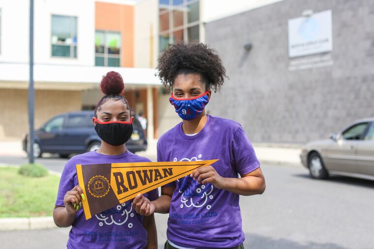 Julianna Hilton, 18, (left) and Jessica Rodriguez, 17, (right) of Camden, in front of the Camden Boys & Girls Club. Both teens are heading to Rowan University with help from a Pennsauken business that has set up a $200,000 scholarship fund to help Camden students.