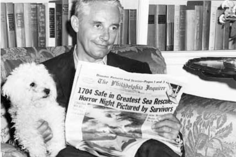 At home after surviving the sinking of the Andrea Doria, Mayor Richardson Dilworth relaxes with a poodle and The Inquirer's front-page article. The newspaper photos spurred calls and letters from citizens - concerned about the sofa.
