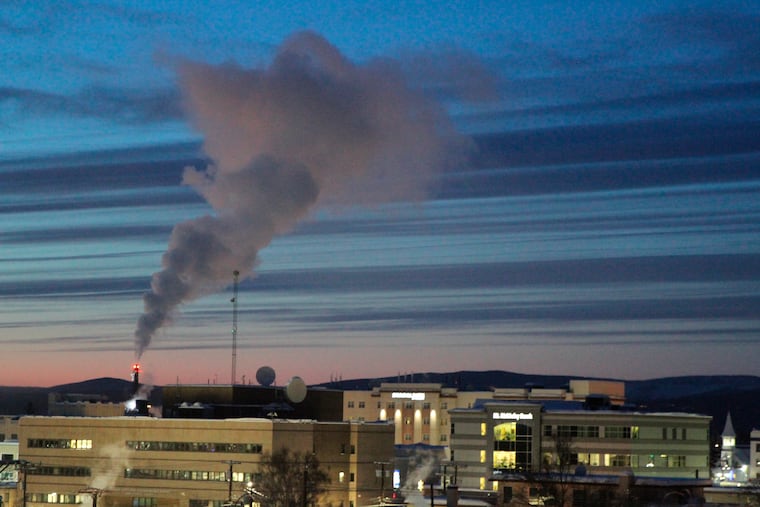 A plume of smoke being emitted into the air from a power plant in 2022 in Fairbanks, Alaska.