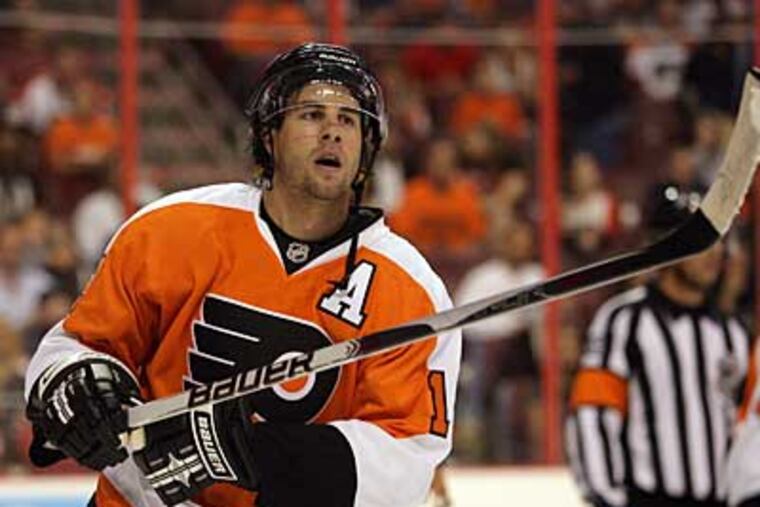 Flyers' left winger Simon Gagne was diagnosed with two small hernias earlier today. (Yong Kim / Staff Photographer)