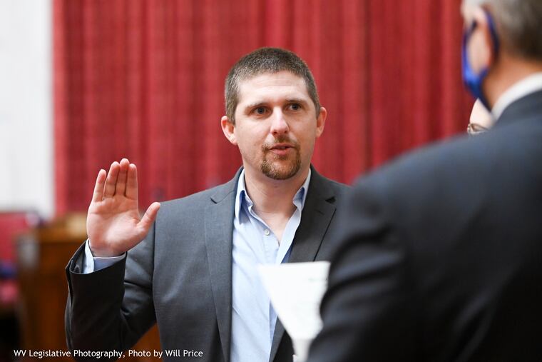 Derrick Evans at his swearing-in ceremony to the West Virginia House of Delegates on Dec. 1, 2020, in Charleston, W.Va. Evans was part of the mob that stormed the Capitol on Jan. 6, 2021.