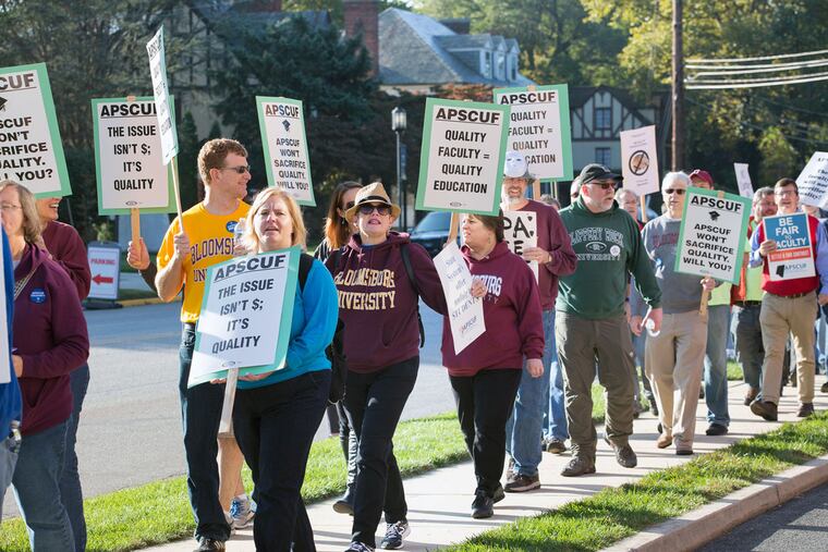 Faculty from the 14 state universities rallying for a new contract outside the Dixon Center in Harrisburg, where the system's board of governors was meeting earlier this month.