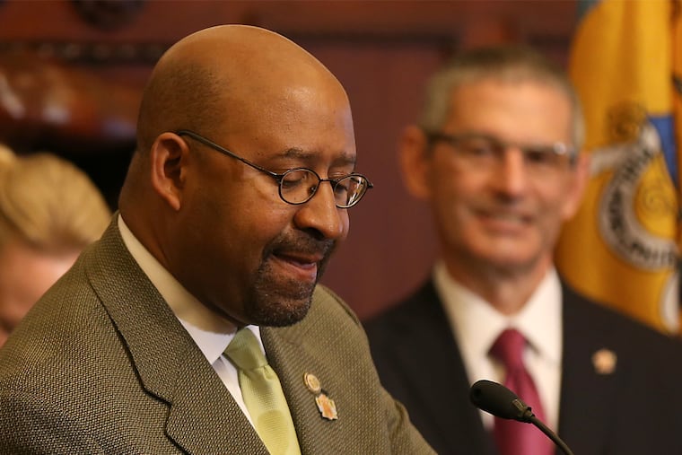 Mayor Michael Nutter pauses during a news conference at City Hall about the Papal visit in Philadelphia, PA on September 28, 2015.