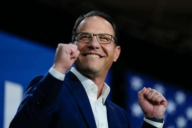 Pennsylvania Gov. Josh Shapiro gestures at a campaign event for Democratic presidential candidate Vice President Kamala Harris in Ambler, Pa., Monday, July 29, 2024.