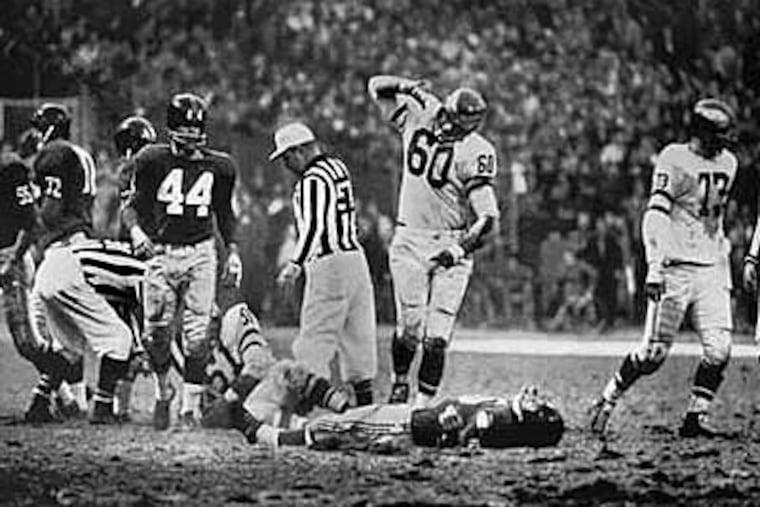 Eagle Chuck Bednarik's infamous hit on Giants Frank Gifford.