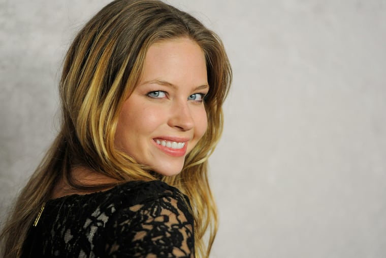 Actor Daveigh Chase poses at the Season 5 premiere of HBO series "Big Love," in Los Angeles on Jan. 12, 2011.