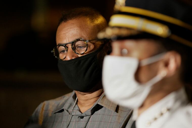 Councilman Curtis Jones Jr (left) listens as Police Commissioner Danielle Outlaw decries the shooting of a 7-year-old boy Saturday night on the 200 block of North Simpson Street in West Philadelphia.