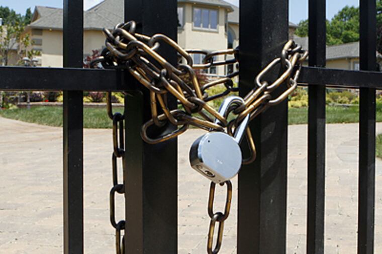 Vincent and Chantal Esteves lived in a 5,000-square-foot home with its own dance floor and DJ booth, weight room, game room and home theater with stadium seating. (Bonnie Weller/Inquirer)