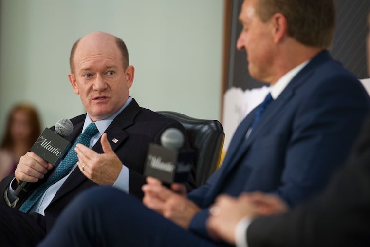 Sen. Chris Coons (left), a Delaware Democrat, speaks alongside Sen. Jeff Flake (R., Ariz.) during an interview at the The Atlantic's 'The Constitution in Crisis' forum in Washington on Oct. 2, 2018. Coons has become a voice for civility in Congress, and has often cooperated with Flake.