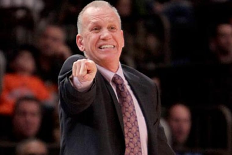 Doug Collins said Thursday that Spencer Hawes would face the Heat but sit against the Bulls. (Seth Wenig/AP)