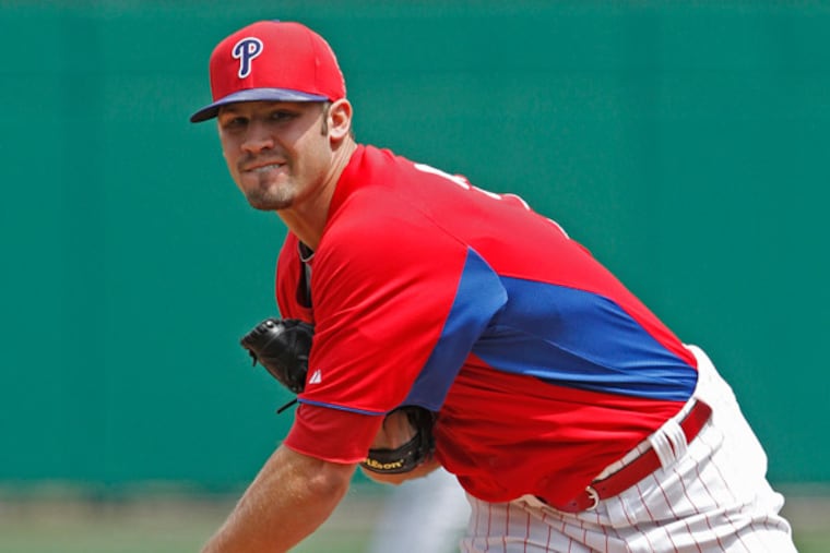 Adam Morgan pitching against the Atlanta Braves March 22, 2013. (Michael Bryant/Staff Photographer)