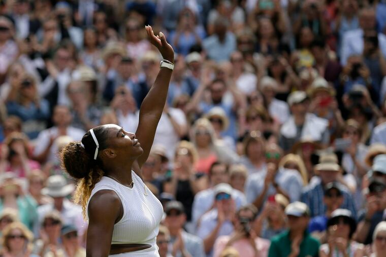 United States' Serena Williams celebrates defeating the Czech Republic's Barbora Strycova in the women's singles semifinals at Wimbledon.
