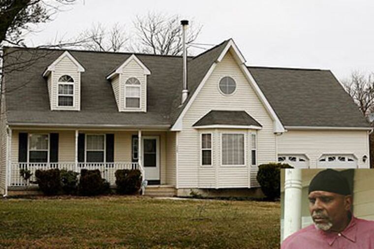The home of the Mobley family in Buena, N.J. Charles Mobley (inset) has said his son Sharif, 26, is not a terrorist, even though the FBI claims he's an al-Qaida member and tried to shoot his way out of a hospital in Yemen. (AP Photos / Mel Evans)