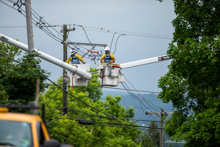 Peco workers check the power lines in Pottstown in this 2022 file photo.