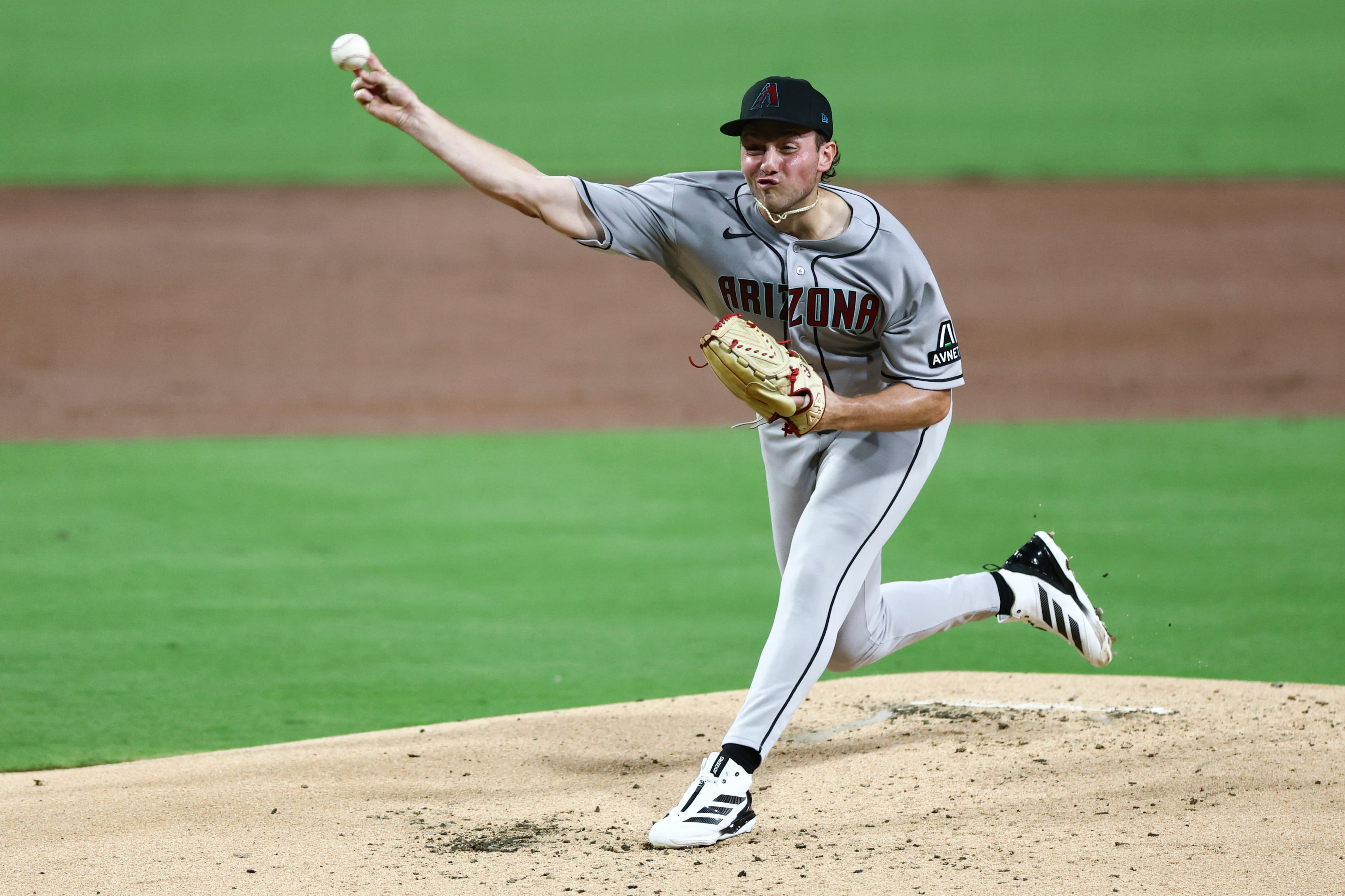 Arenado, Perdomo lead Diamondbacks over Padres 11-4 to stay alive in wild-card hunt