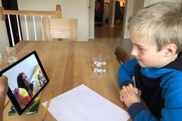 Piet Queisser, a kindergartner at Cooper Elementary in Cherry Hill, talks with teacher Jill Hammel via FaceTime. Hammel uses technology to keep up with her students while school is closed due to the coronavirus pandemic.