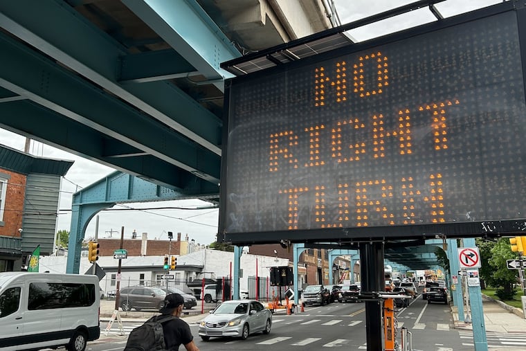 New street signage on either side Kensington Avenue warns drivers they can no longer turn down Adams Avenue after the city changed the direction of the street.
