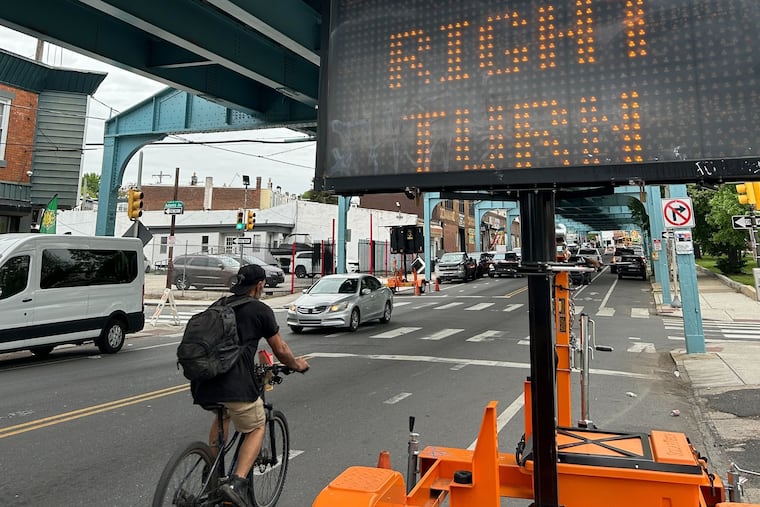 New street signage on either side Kensington Avenue warns drivers they can no longer turn down Adams Avenue after the city changed the direction of the street.