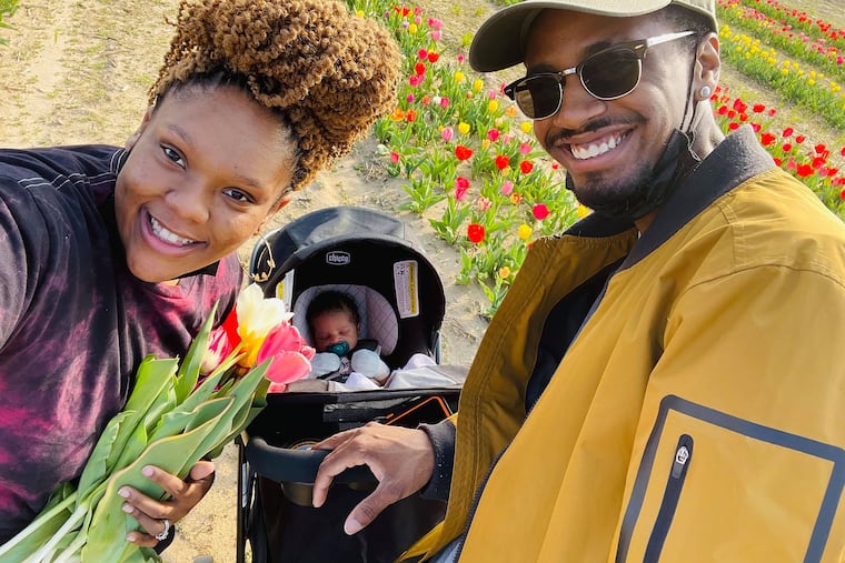 Aja and Ronald on an outing with baby Cree.