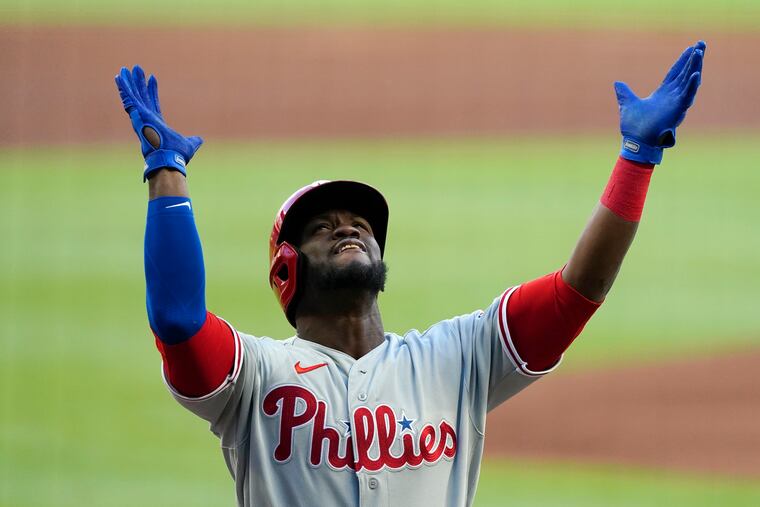 Odúbel Herrera reacts as he crosses the plate after hitting a three-run home run in the first inning of the Phillies' 12-2 in over the Braves Friday in Atlanta.