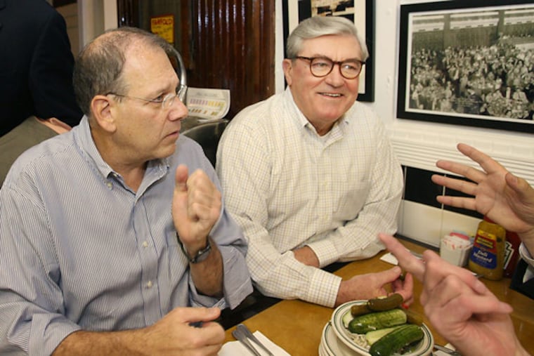 Former Philadelphia Mayor Bill Green III, right, and political consultant Neil Oxman, left, take part in a Philadelphia political tradition they helped start by eating at the Famous 4th Street Deli on Election Day 2008.