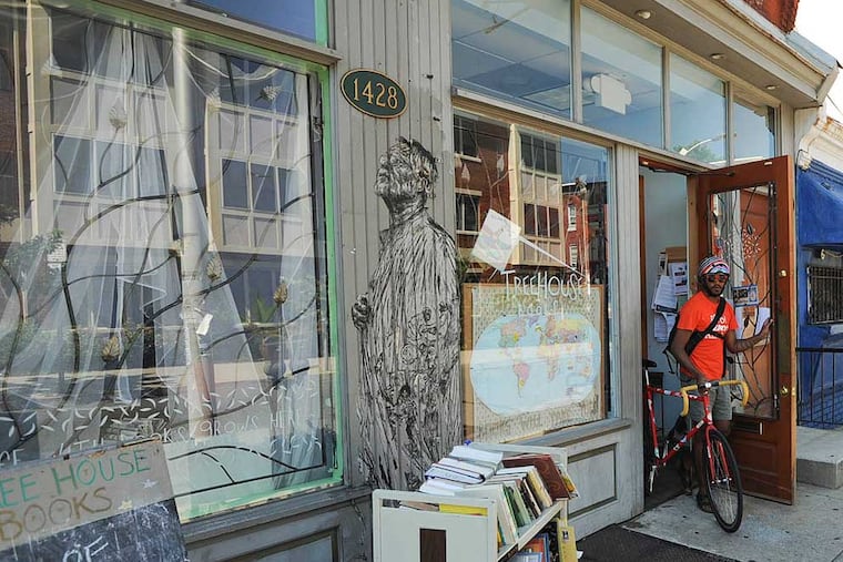 Someone leaves Tree House Books to make a delivery in this 2013 file photo. The literacy nonprofit, based in North Philadelphia, suffered the loss of its entire giving library when a burst pipe was discovered on Christmas Day.