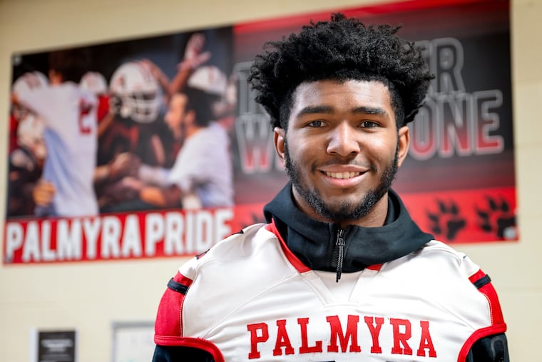Palmyra High School running back Kwinten Ives poses at the school in January. He has signed with Nebraska