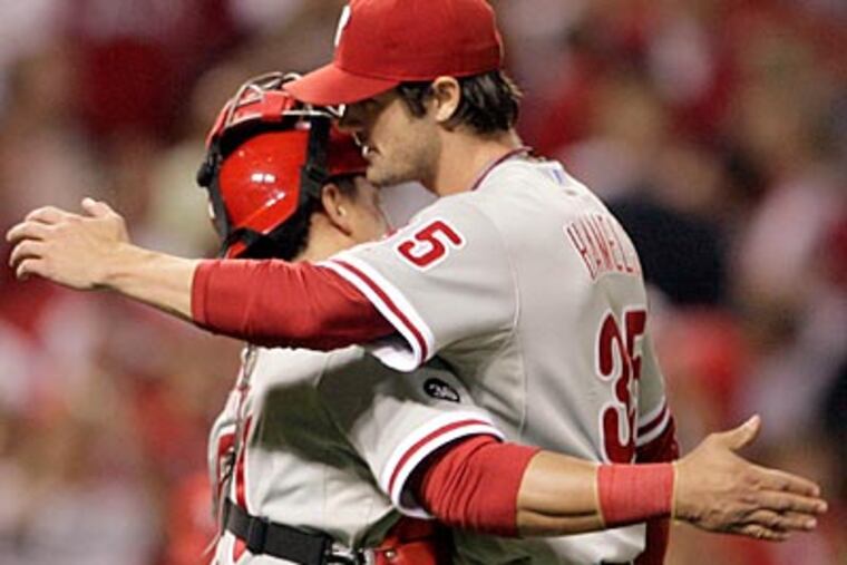 Gonzo flipped between the Eagles game and Cole Hamels' 2-0 shutout of the Reds. (Yong Kim / Staff Photographer)