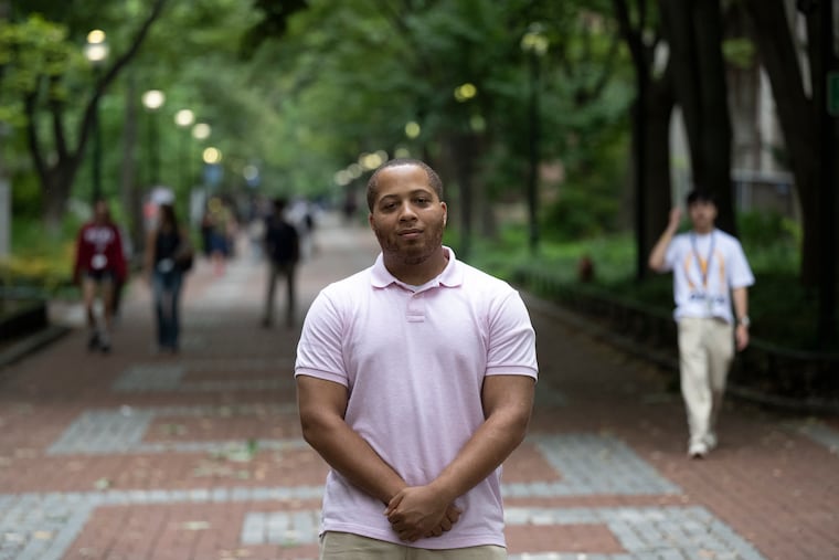 Jonathan Lamothe, a recent Wharton School graduate, poses for a photo at the University of Pennsylvania as he begins his journey into the job market.