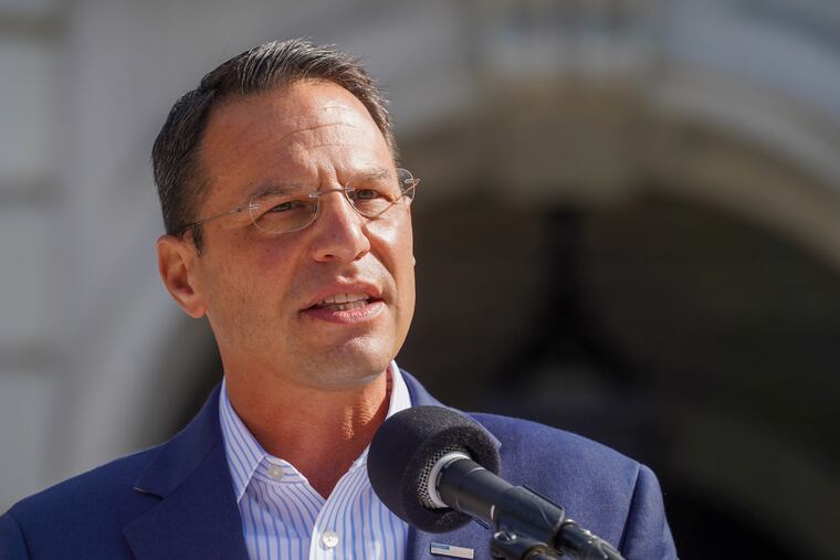 Attorney General Josh Shapiro speaks outside the Pennsylvania State Capitol in Harrisburg.
