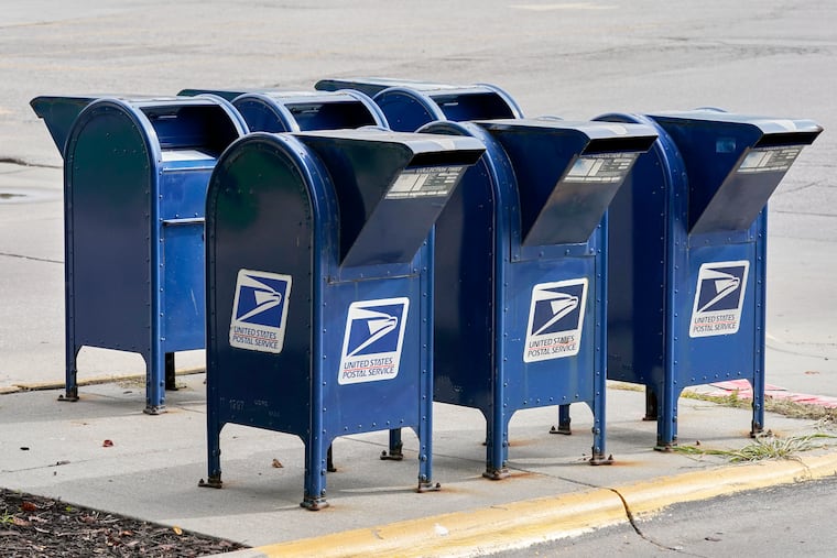 Three men have been charged by federal authorities with using a stolen Postal Service key to take and alter checks and money orders.