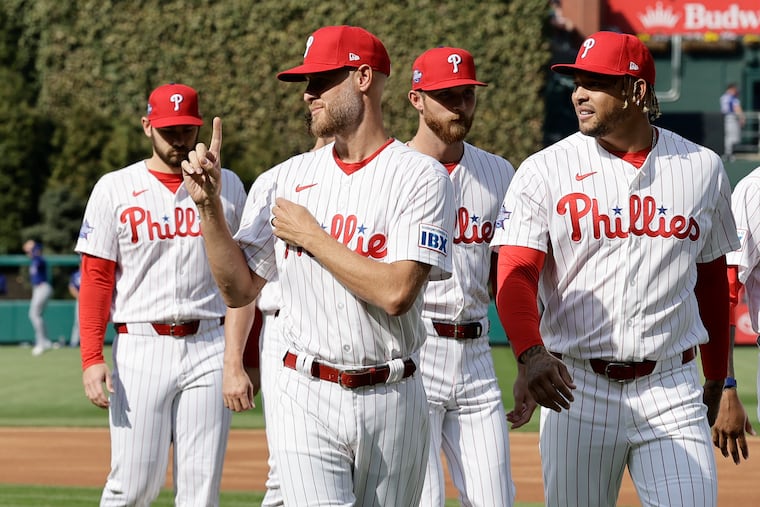 Zack Wheeler (center) will make at least one, possible two more minor-league starts before rejoining the Phillies' rotation.
