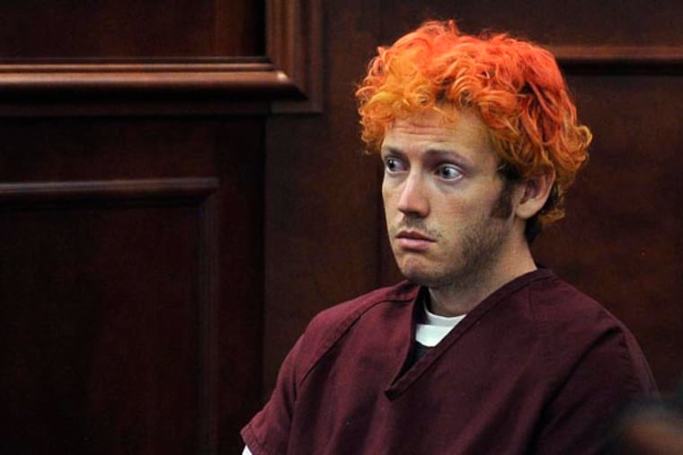 In this July 23, 2012 file photo, James E. Holmes appears in Arapahoe County District Court in Centennial, Colo. Holmes was being held on suspicion of first-degree murder, and facing additional counts of aggravated assault and weapons violations stemming from a mass shooting in a movie theater in Aurora, Colo., that killed 12 and injured dozens of others. (AP Photo)