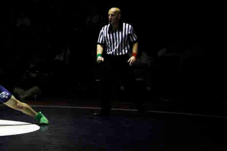 Shikellamy's Zac Cooper goes for the leg of Central Mountain's Tyler Buckwalter. Pa.'s high school wrestling is the best, Penn State's coach says.