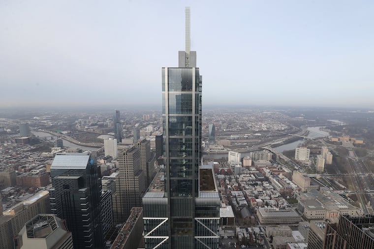 The top of the Comcast Technology Center, as seen from the adjacent Comcast Center.
