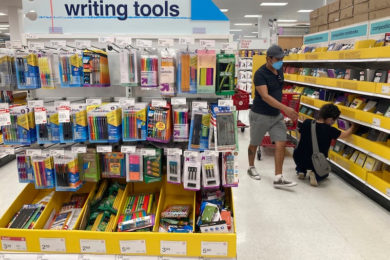 Shoppers look for school supplies deals at a Target store.