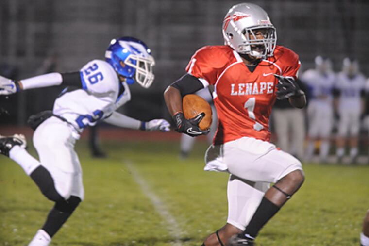 Ta'Ron Earl of Lenape runs the ball back 95 yards for a touchdown during the first play of the game. (Bob Williams For The Inquirer)
