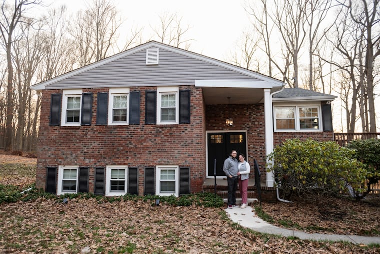 Dean Koch (left) and Marissa Diorio (right) outside their home in Malvern.