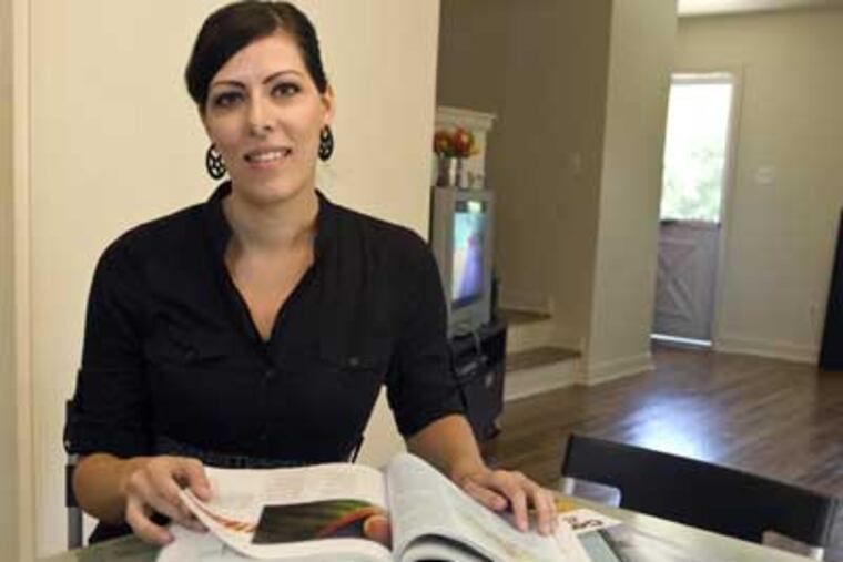 Paula Arroyo, 30, of Haddon Township has returned to college thanks to Camden County College's forgiveness program. (Ron Tarver / Staff Photographer)