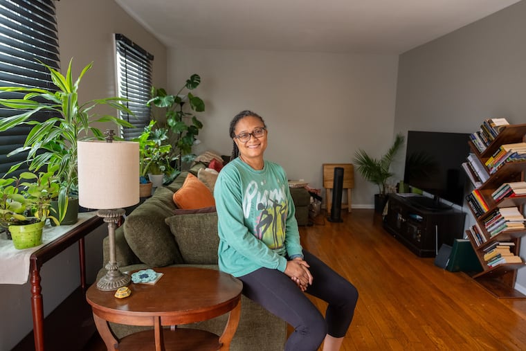 Plants are abundant - inside and out - at Thompson's 1,360-square-foot home, including the living room.