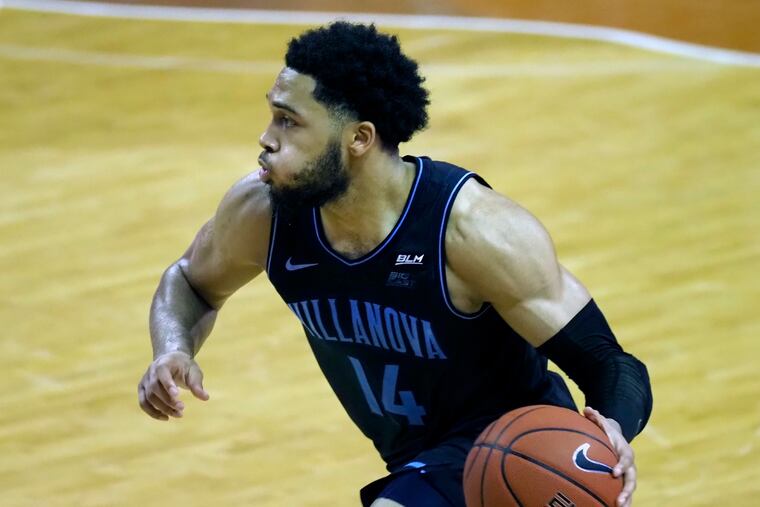 Collin Gillespie and Caleb Daniels, shown here, led the Wildcats with 18 points apiece.