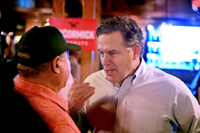 David McCormick, a Pennsylvania Republican Senate candidate, campaigns in Conshohocken on Monday.