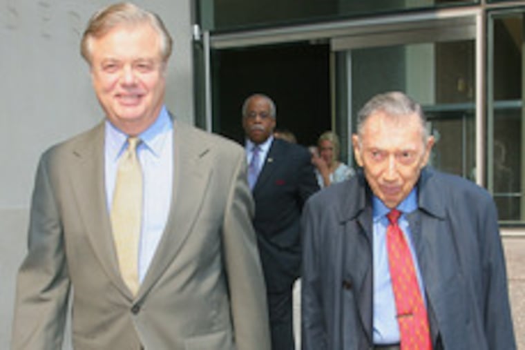 State Sen. Vince Fumo (left) leaves court yesterday after hearing on whether Richard A. Sprague (right) should represent him.