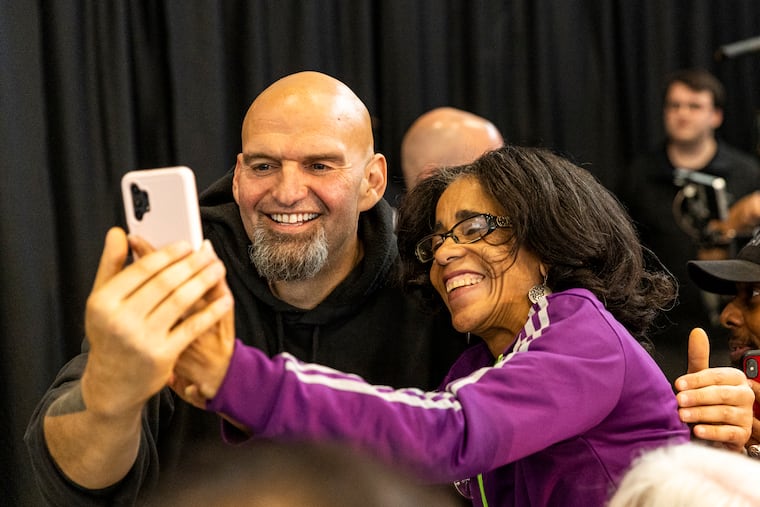 John Fetterman takes a selfie with Desiree Whitfield, a fellow stroke survivor, at the Dorothy Emanuel Recreation Center in Philadelphia on Sept. 23.