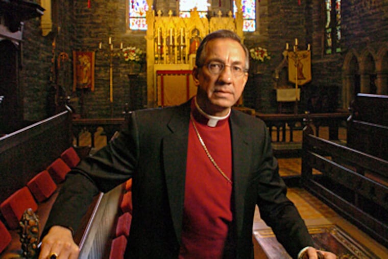 The Rev. David Moyer at the Church of the Good Shepherd in Rosemont. He said he hopes to become a Roman Catholic priest. (Clem Murray / Staff Photographer)