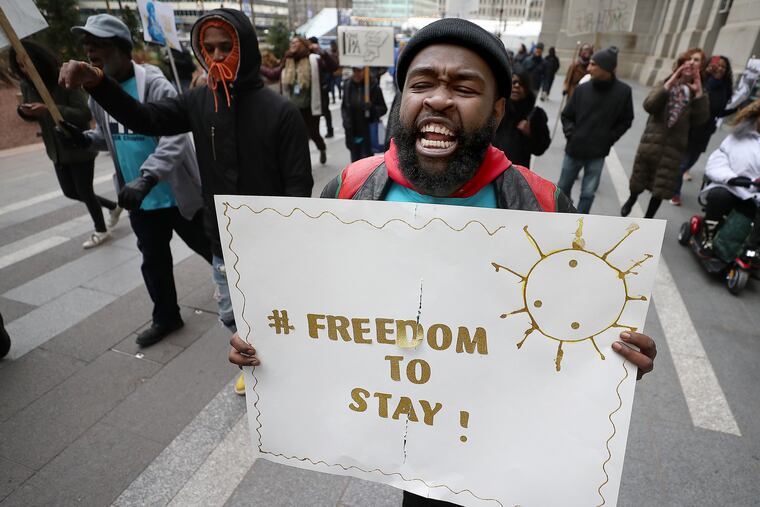 Dante McCall, of One PA, chanting with fellow demonstrators as they marched around City Hall in Philadelphia on Feb. 20. The group is seeking protections for renters and homeowners amid a gentrifying Philadelphia.