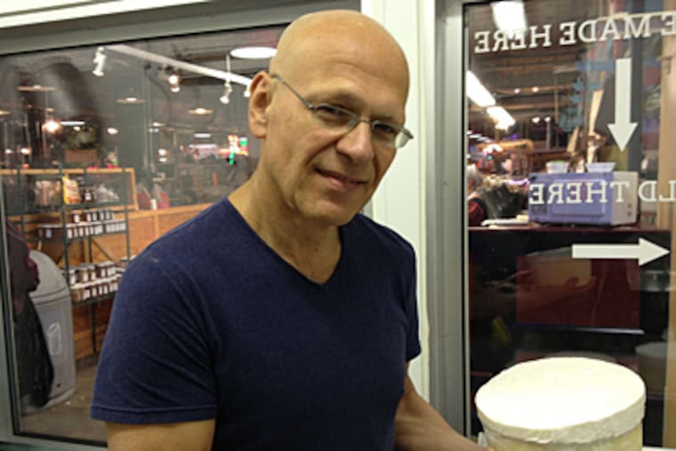 MICHAEL HINKELMAN / DAILY NEWS STAFF Eran Wajswol , owner of the Jersey-based Valley Shepherd Creamery, recently opened a retail outlet at Reading Terminal Market.