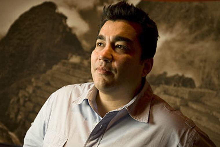 "I'm an optimist," chef Jose Garces says of his upcoming ventures. (Eric Mencher/Staff Photographer)