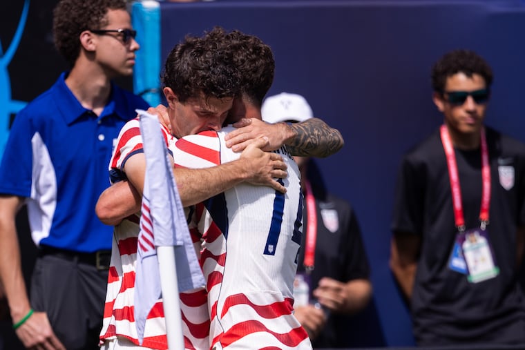 Christian Pulisic (left) celebrates with Sebastian Berhalter after scoring for the U.S. men's soccer team in Sunday's win over Senegal.